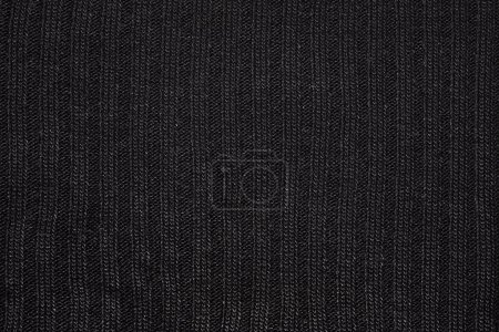 Téléchargez les photos : Tricot noir. trucs de réchauffement de la planète. tissu chauffant hiver. - en image libre de droit
