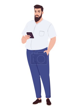 Photo for A bearded overweight man in a shirt and jeans stands writing a message on a smartphone - Royalty Free Image