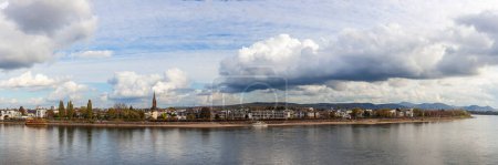 Photo for Bonn, North-Rhein Westfalia, Germany - November 5, 2022: Cityscape and riverside of Rhein river in Bonn, Germany. Autumn promenade on a cloudy day - Royalty Free Image