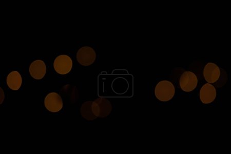 Blurred bokeh circles on a dark background