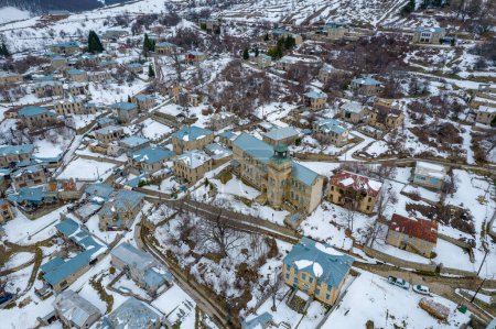 Aerial view of traditional architecture  with  stone buildings during  winter season in the picturesque village of Nymfaio  Florinas Greece