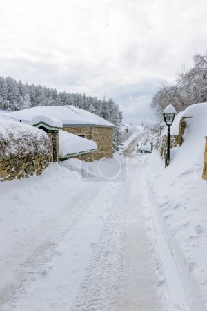 Photo for View of snowy Nymfaio florinas  the picturesque traditional village of north Greece also known for  Arcturos organisation which protects brown bears. - Royalty Free Image