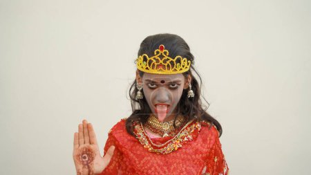 Photo for Durga Puja Look Photo-shoot based on agomoni Festival with ethnic look.like A face of Hindu goddess Durga. Goddess Durga for Happy Navratri Celebration Poster Or Banner Background - Royalty Free Image