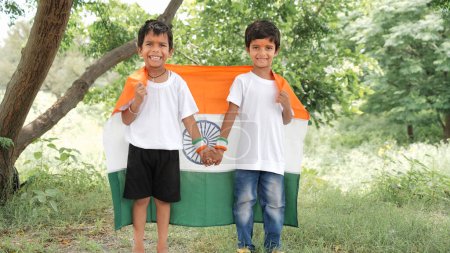 Photo for Little boy holding Indian flag in hand on the occasion of Independence day India celebrations - Royalty Free Image