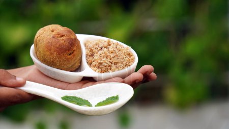 Photo for Rajasthani Traditional Cuisine Dal Baati Also Know as Dal Bati or Daal Baati Churma. It is popular in Rajasthan, Uttar Pradesh and Madhya Pradesh. - Royalty Free Image