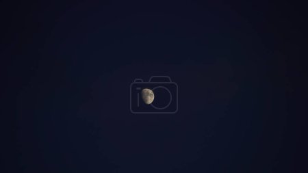 Photo for Backgrounds night sky with stars and moon and clouds. Beautiful full moon over clouds during night time - Royalty Free Image