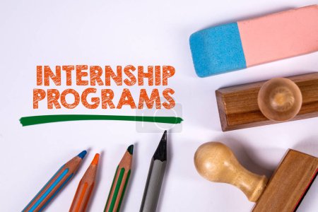 Photo for Internship Programs. Colored pencils, stamps and eraser on a white background. - Royalty Free Image