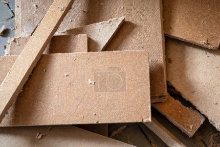 Wood fibre board Scraps. Construction and insulation boards. Construction site.