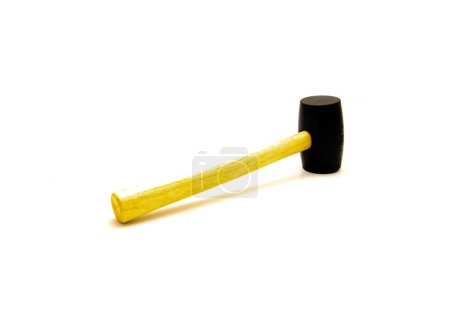 Photo for Wooden handle of rubber mallet hummer molded to rubber head to minimize marring and surface damage, nonsparking and shock absorption isolated on white background. Tool clipping path copy space - Royalty Free Image