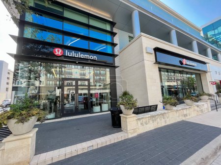 Photo for PLANO, TX, US-AUG 18, 2023: Wide-angle view large Lululemon store in urban Legacy West lifestyle center in Plano, Texas surrounding by retail, restaurant and office space. Canadian high-end sportwear - Royalty Free Image