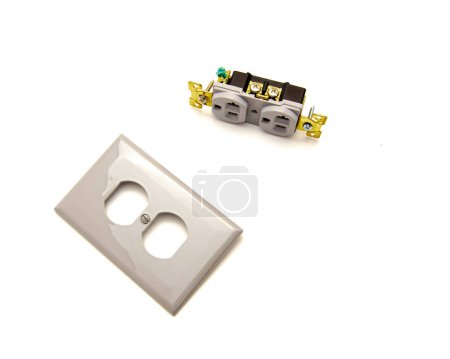 Photo for Polycarbonate wall plate with gray finish industrial grade duplex receptacle 20A-125V capacity, 5-leaf brass, superior plug retention isolated on white background. 3-prong outlet plug copy space - Royalty Free Image
