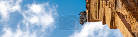 Photo for Panorama looking up corner of North Tower or Thap Chinh with ancient carved pattern of statues, Ponagar Cham Towers built of recycled bricks, actively worship by Cham, religious attractions. Vietnam - Royalty Free Image