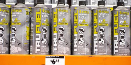 Photo for DALLAS, TX-MAR 2, 2024: Panorama view 32oz grey steel container TruFuel premixed fuel with synthetic lubricants, stabilizers for 4-cycle power equipment on shelves, price tags at Home Depot store. USA - Royalty Free Image