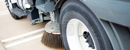 Photo for Panorama angle gutter broom rotatilt feature angle suit road profile camber, modern sweeper truck, steel plate disc, hydraulic trailing arm adjust to variable surfaces, curbs street sweeping. USA - Royalty Free Image