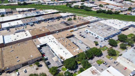 Dense industrial and commercial property warehouse, showroom, outlet in Stemmons Corridor, Lower Stemmons zone, Downtown Northwest Dallas, Turtle Creek, Trinity River, Irving Blvd, aerial view. USA