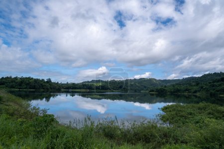 Photo for Wang Bon Reservoir, surrounded by trees and mountains, the top part is the sky - Royalty Free Image