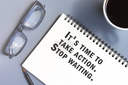 Photo for Motivational and inspirational quote on notepad - It is time to take action. Stop waiting. - Royalty Free Image