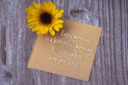 Photo for Motivational on brown note with gerbera yellow flower on wooden surface - Every morning is a beautiful morning, it is your choice how you see it. - Royalty Free Image