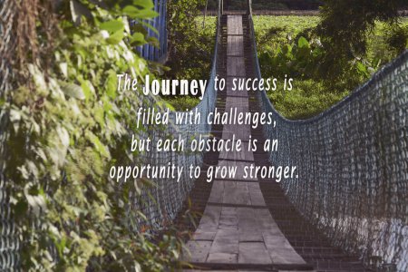 Hanging bridge with motivational and inspirational quote about journey to success.
