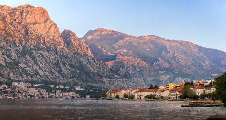 Photo for View to Prcanj Beach district of Kotor Bay Montenegro at sunset. - Royalty Free Image