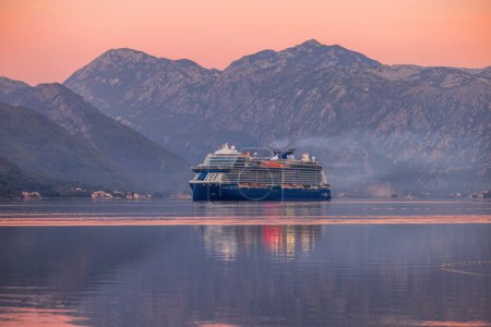 Photo for Kotor, Montenegro - September 13 2023: Cruise Ship is arriving to the Kotor Bay at sunrise. - Royalty Free Image