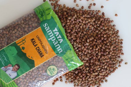 Photo for Delhi, India, April 2023: Tata Sampann Unpolished Kala Chana, 1kg packet. Kala Chana is also known as Bengal Gram, Black Chickpeas, Brown Chickpeas. Good source of protein for vegetarians - Royalty Free Image