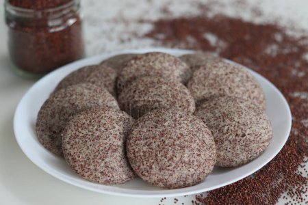 Photo for Ragi Idli. A nutritious South Indian staple made with fermented batter of unpolished finger millet and deskinned black gram. Perfect blend of tradition and health. Good for food and wellness concepts - Royalty Free Image