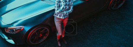 Photo for Side view of sports car and a woman leaning against the car to talk on the phone, 3 dimensions and illustrations - Royalty Free Image