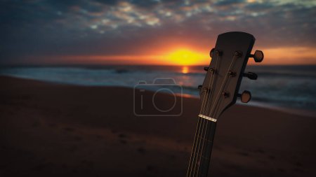 Foto de Guitarra acústica en la playa de arena En el fondo es el mar donde el sol se está poniendo, concepto, música y tourism.3d rendición e ilustración. - Imagen libre de derechos