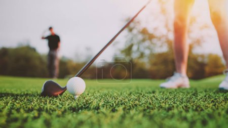 Golf ball on grass in front of golf club. 3d, rendering, illustration,