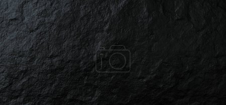 Téléchargez les photos : Photographie d'une surface d'ardoise noire avec un motif ondulé. Reflète la lumière et semble dimensionnelle. - en image libre de droit