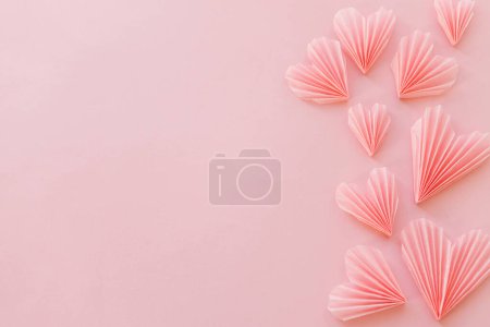 Photo for Happy Valentine's day! Stylish pink hearts flat lay on pink paper background. Modern cute valentine hearts card with space for text. Creative love banner - Royalty Free Image