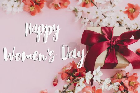 Photo for Happy womens day greeting card. Happy womens day text and stylish gift box with flowers on pink background. Handwritten sign. 8 march international women's day - Royalty Free Image