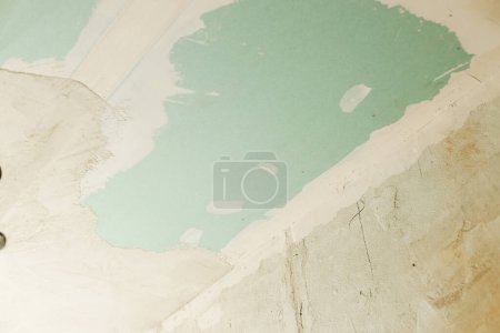 Photo for Plasterboard ceiling with electricity and ventilation in unfinished bathroom. Construction of house and home renovation concept. Close up of dropped ceiling - Royalty Free Image