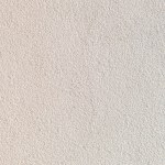 Plaster wall background close up. House exterior renovation, white plaster walls texture. Facade improvement
