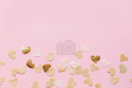 Photo for Stylish hearts on pink background flat lay. Happy Valentines day and happy mother's day. Valentine banner, gold hearts border with space for text. Mothers day card - Royalty Free Image