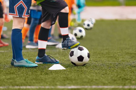 Photo for Soccer training lesson for children. Soccer bacground. Football training game soccer players with soccer balls.jpg - Royalty Free Image