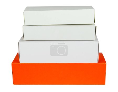 Photo for Pile of red and white cardboard boxes isolated from background - Royalty Free Image