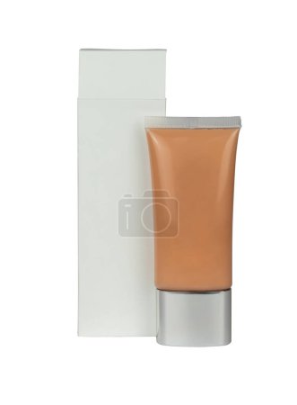 Photo for Liquid makeup foundation out of blank white cardboard box isolated from background - Royalty Free Image