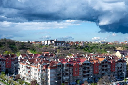 Photo for Before supercell storm - stormy sky above a quarter of city residential buildings - Royalty Free Image
