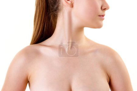 Photo for Cropped photo of young female body. Bare shoulders, neck, collarbones, bust of woman. Skincare cosmetic treatment affect. Concept youth, natural beauty, healthy lifestyle, body and skin care. - Royalty Free Image