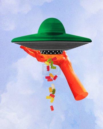 Photo for Contemporary art. collage. Hand holding green, hat like UFO dispensing array of gummy bears against cloudy sky, textured background. Contemporary art. collage. against textured background - Royalty Free Image