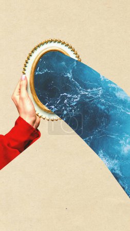 Contemporary art. collage. Hand in red sleeve holding mirror revealing ocean waves against paper background. Concept of natural beauty, self-love, world, creativity, inspiration.