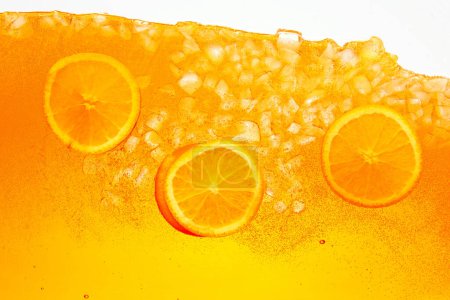 Textured photo. Festive arrangement of citrus fruit, orange slices crowns celebratory drink. Abstract wallpaper. Concept of food and drinks, summer, vitamins, nutrition, dieting.