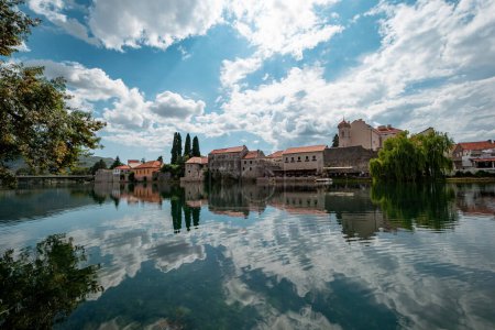 Photo for Trebinje old town view and reflection in Trebisnjica river. Bosnia and Herzegovina - Royalty Free Image