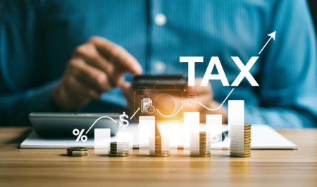 Photo for Tax deduction planning and pay taxes online concept. Expenses, account, VAT, income tax, and property tax, pay tax. Net income, plans to allocate money for expenses, allowances and donations. - Royalty Free Image