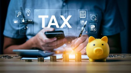 Tax deduction planning concept. Businessman calculating business balance prepare tax reduction. taxes paid by individuals and corporations such as VAT, income tax and property tax.