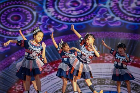 Photo for Rome, Italy - February 18, 2024: Chinese New Year celebrations in the square, public event. Chinese little girls dance on stage. - Royalty Free Image