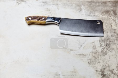 Photo for Meat cleaver on wooden background. Stainless steel Kitchen knife or Butcher cleaver on a wood blackboard - Royalty Free Image