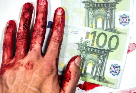 Euros Geld und Hände mit roten Blutflecken. Verhaftung wegen illegaler Verbrechen. Hat das Gesetz gebrochen. Bestechungskonzept. Strafrechtliche Probleme. Illegaler Geldverkauf.